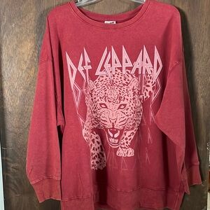 Ladies Def Leppard sweatshirt. Size X-LARGE. Maroon color.